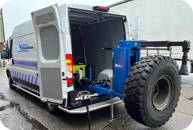 a white van with large tires