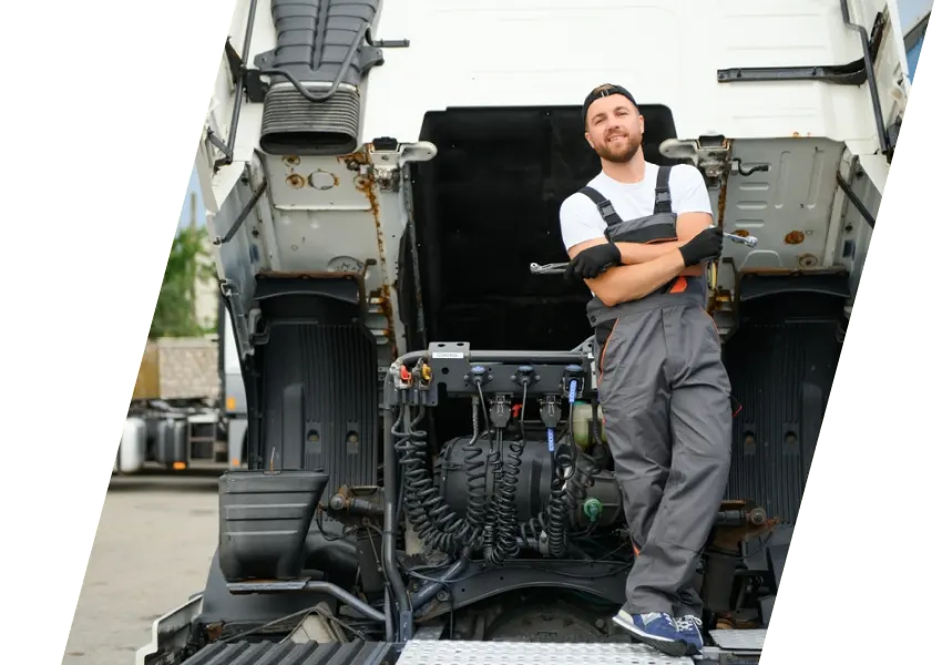 a person standing in front of a truck